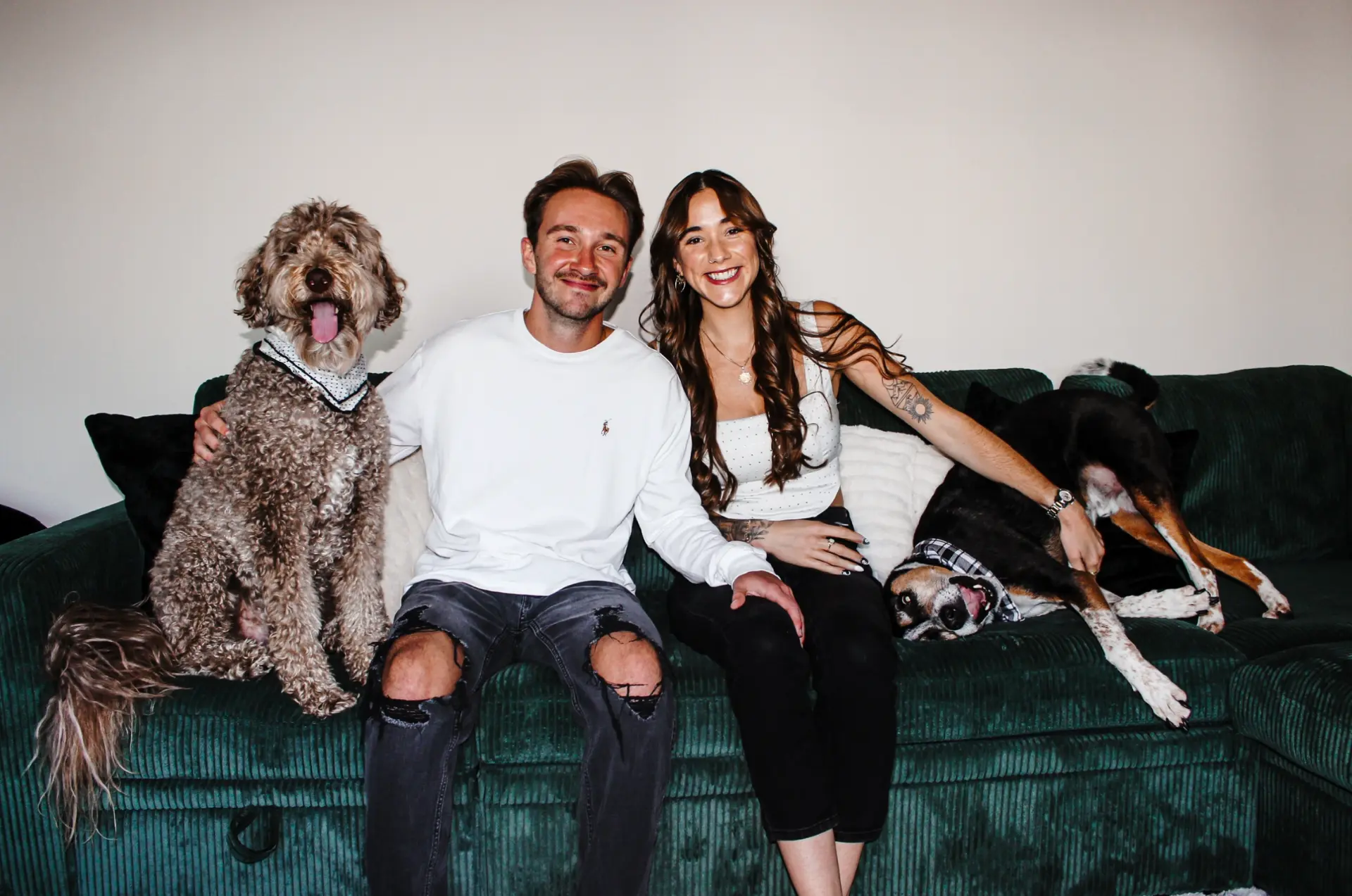 Tyler and Kali at home with their dogs Ollie and Kona